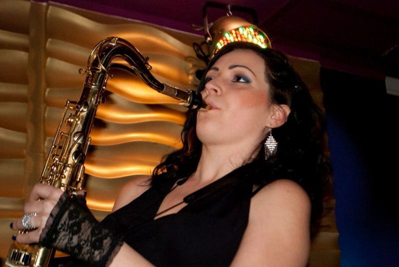 female saxophone player kota